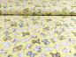 Preview: Patchworkstoff mit vielen kleinen Hasenbabies auf gelb von Henry Glass Fabrics